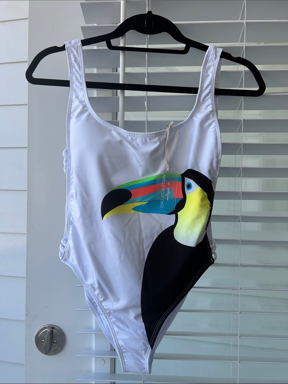 Kenny Flowers White One-Piece with Colorful Toucan Graphic